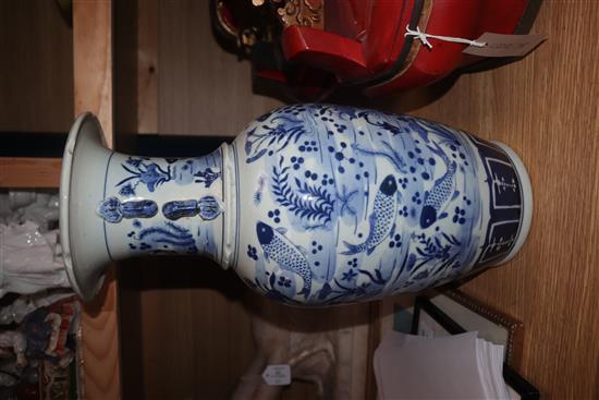 A Chinese blue and white fish vase height 43cm